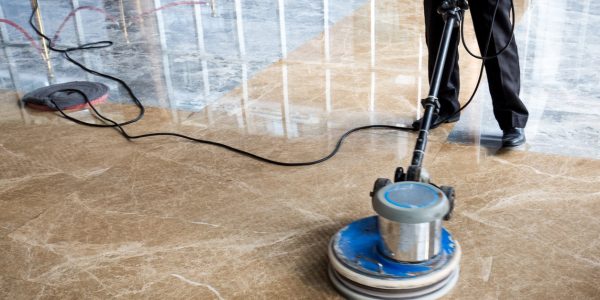 technician polishing marble floors